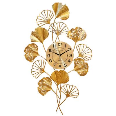 China Contemporary Metal Art Wall Clock Golden Ginkgo Leaves Creative Design for Living Room Home Decoration for sale