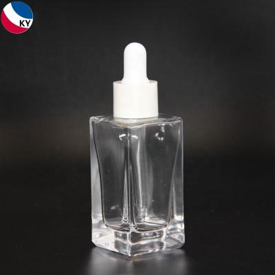 China Luxury Rectangle Shoulder 30Ml Personal Care Essential Oil Dropper Glass Bottle With Quality Aluminum Screw Cap For Cosmetic Bottle for sale