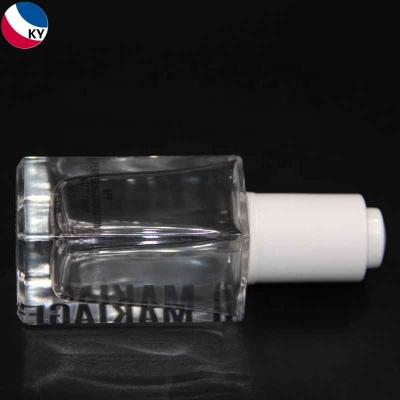 China Thick Wall And Bottom Glass Retangular Oil Dropper Bottle 30Ml Clear Frosted Bottle With White Dropper for sale