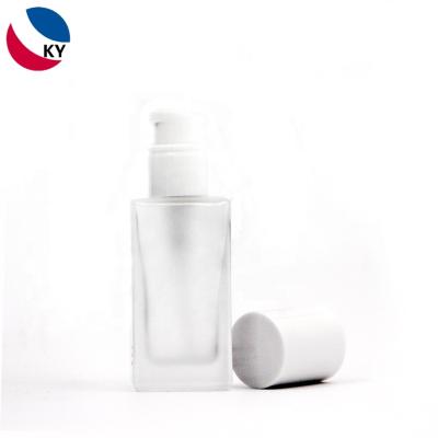 China Thick wall and bottom 30ml empty matte white glass press pump bottles for sale