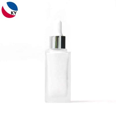 China Cosmetic Luxury Thick Bottom Thick Wall Serum Packaging 20Ml White Cap Dropper Bottle for sale