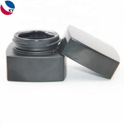 China High Quality Personal Care Cosmetic Cream Containers Ribbed Lid Black Frosted Glass Jar for sale