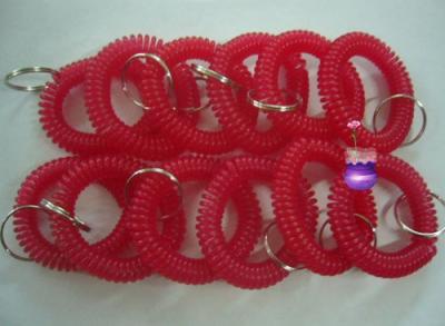 China 12pcs/lot plastic spiral coil wrist band key ring chain red color keyrings factory cheap for sale