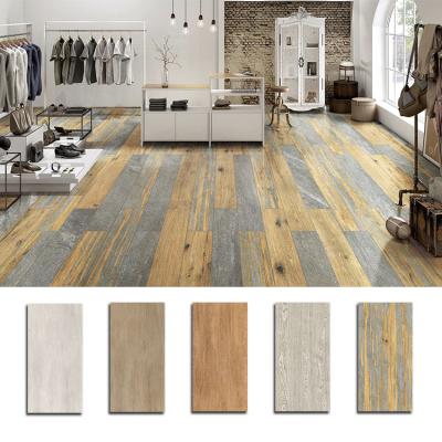 China Rustic Tiles 600 1200 Modern Porcelain Texture Plank Wood Flooring Ceramic Wood Look Flooring Tiles for sale