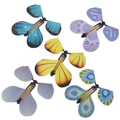 China Magic Butterfly Toy PVC Flying Wind Up Butterfly Toy Rubber Band Powered Butterfly For Big Surprise Wedding Birthday Gift for sale