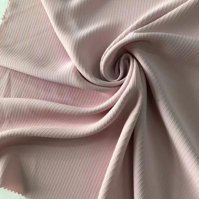 China Convex Extinguishing Anti-Static Lattice 100% Polyester Tape Design Fabric Suitable For Dresses And Shirts for sale