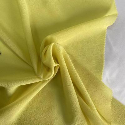 China Anti-static high quality 100%Polyester chiffon pearl ggt plain dyed premium fabrics for dress and scarf for sale