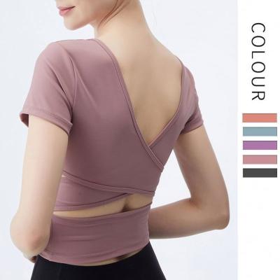 China Breathable Women Cross Back Sports Crop Top Padded Yoga Short Sleeve Gym Fitness Shirts Quick Dry Running T-Shirt With V-Neckline for sale