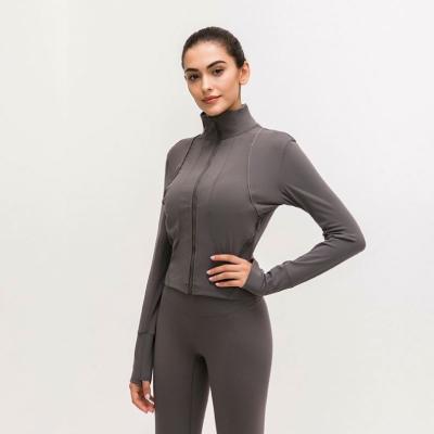 China OEM Breathable Stand Collar Slim Yoga Suit Milled Casual Tops Nude Zipper Bodybuilding Sports Coat Female Jacket for sale