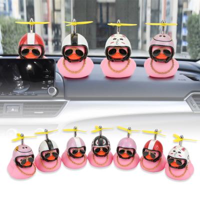 China New Luxury Car Pink Duck With Broken Helmet Wind Small Duck Road Bike Motor Helmet Yellow For Car Ornament Rearview Mirror for sale