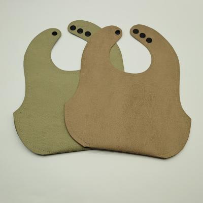 China BPA Free Home Toddler Manufacturer Waterproof Vegan Leather Baby Feeding Bib for sale