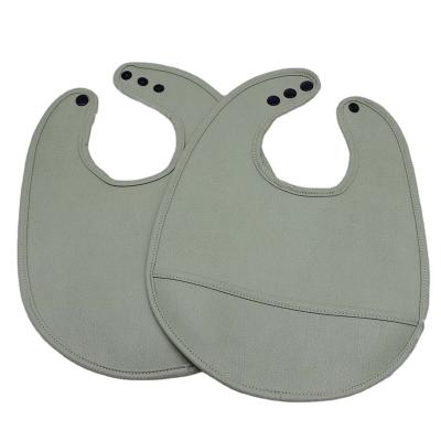 China BPA Free Waterproof Leather Baby Bibs With Custom Logo And Printing for sale