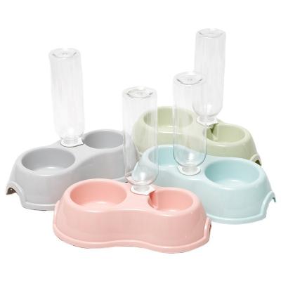 China Polypropylene Round Plastic Double Pet Bowl With Drinking Water Bottle for sale