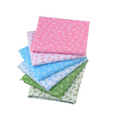 China breathable & Eco-friendly Colorful Bow-knot Printed Cotton Fabric Handmade DIY Sewing For Kid Bedding for sale