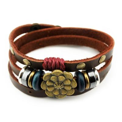 China Vintage Bangle Women Personality Multilayer Leather Flower Button Wrap Snap Bracelets for sale