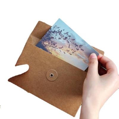 China Custom High Quality Recyclable New Product Kraft Paper Printing Black Brown Envelope With Button And String for sale