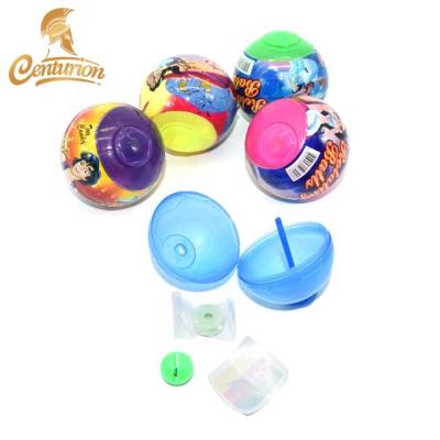 China Natural Funny Candy Toy Rotating Ball With Whistle Candy And Tattoo Sticker for sale