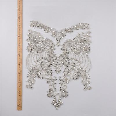 China Handmade ZSY Bling wedding beaded lace appliques decorate on bridal dress Embroidered Floral Rhinestone Trim Patches for sale