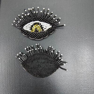 China Handmade ZSY Handmade Magical evil eyes factory wholesale customized embroidery sequin patch hole pattch for clothing for sale