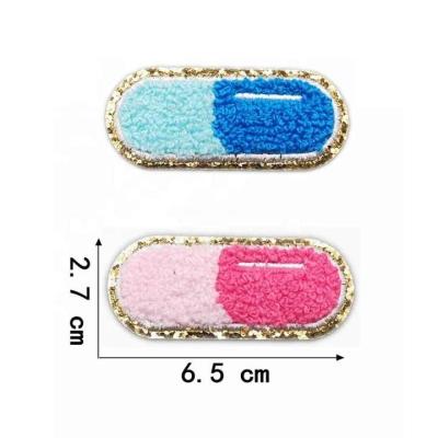 China Sustainable ZSY Blue pills iron chenille patches Fashion Make Up bag Custom chenille patches for sale