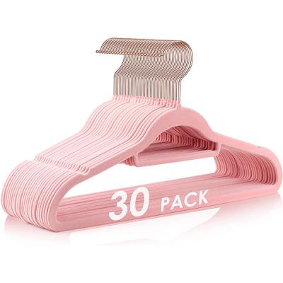 China Clothes drying pink 30PK velvet fabric hanging hangers slip non slip felt hangers with tie rod for wholesale for sale