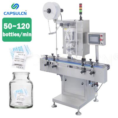 China High Efficiency Pharmaceutical Chemical Automatic Deoxidizer Inserting Desiccant Machine Cutting And Inserting Machine for sale