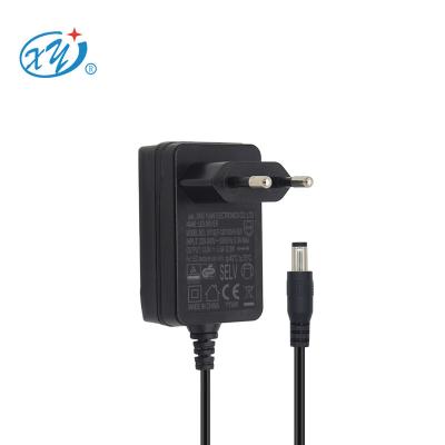 China Xingyuan 12v 1a AC/DC Adapter with CE GS ETL FCC SAA RCM UKCA Certification Wall Mount Power Adapters XY12LF-120100VH-EW for sale