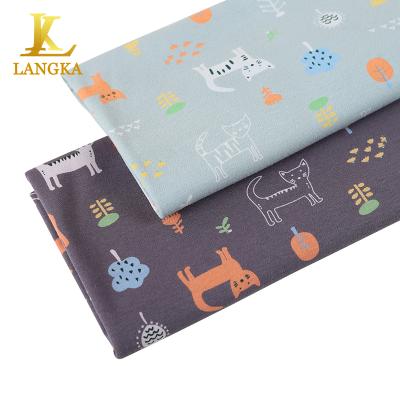 China Langka Anti-Static Printed Baby Cotton Interlock Knit Jersey Pajamas Fabric Super Soft For Kids Children Clothes for sale