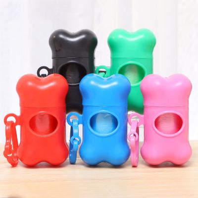 China Portable Bone Shaped Dog Poop Bag Dispenser Pet Stocked Waste Disposal Bag Dispenser for sale