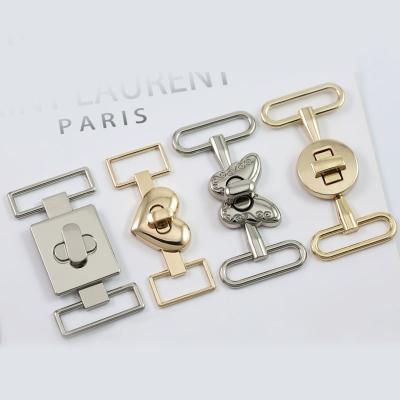 China Corrosion Resistance Fashion Light Gold Bag Accessories Handbag Hardware Gold Turn Lock Metal Bag Buckle for sale