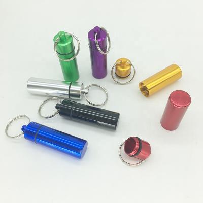 China Decorative Pill Box Holder Waterproof Pill Gifts Capsule Form Mini Portable Aluminum Metal Pill Box With Key Chain for sale