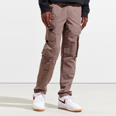 China QUICK DRY Defender Regular and Tall and Tall Sizes Men's Trademark Pants Pocket Casual Waterproof Nylon Utility Cargo Pants Long Pants for sale