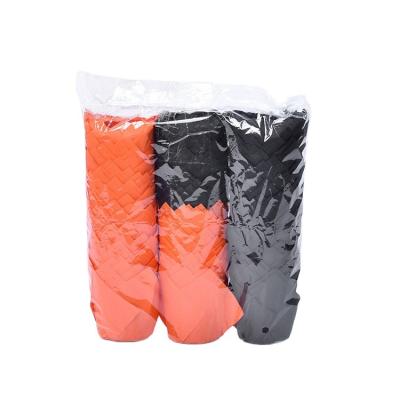 China Disposable Greaseproof Black Orange Tulip Baking Paper Cups Cupcake Muffin Liners for sale