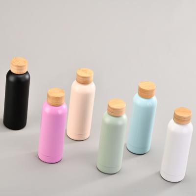 China Sustainable 500ML Double Wall Custom Vacuum Insulated Stainless Steel Water Bottles With Bamboo Lid for sale