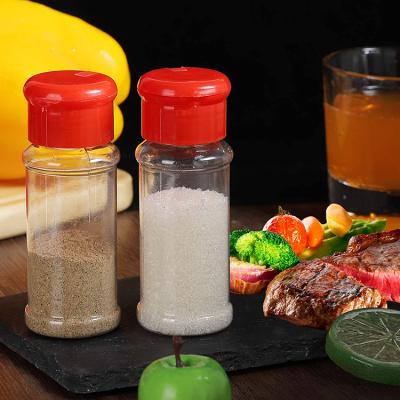 China Kitchen Viable Accessories Empty Clear Plastic PET Spice Salt Pepper Herb Seasoning Shaker Storage Jar Container With Flip Lid for sale