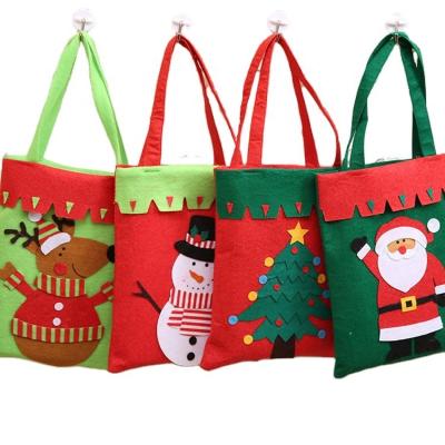 China For Christmas Decoration SHELIKE Nonwoven Fabric Bag Santa Claus Storage Bag Christmas Gift Bag for sale