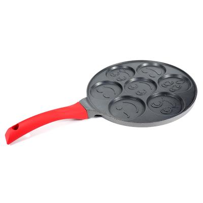 China 2022 High Quality Aluminum Mini Egg Fry 7 Holes Classic Family Kitchen Cake Pan With Smile Shape for sale