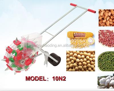 China Cheap Hand Push Planter Carrot Seed Planting Machine Price Manual Corn Seeder for sale