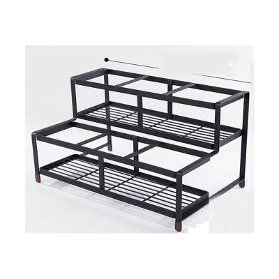 China Modern Home Multi-layer Stainless Steel Shelf Black Kitchen Multifunctional Syrup Bottle Holder for sale