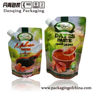 China La goma Doypack de las fechas con el empaquetado de Sause de la categoría alimenticia del canalón se levanta la bolsa con el canalón en venta