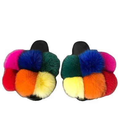 China Damping Factory Uggh Slippers Raccoon Fur Slippers Promotion for sale