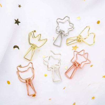 China Different Kinds Of Gold Cute Creative Pins Hold Novelty Star Shape Fish Clips for sale