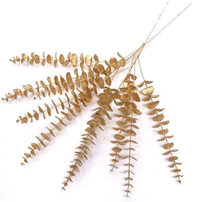 China Eucalyptus artificial golden plant simulation series wholesale reality gold leaf maple leaf plastic wedding decoration for sale