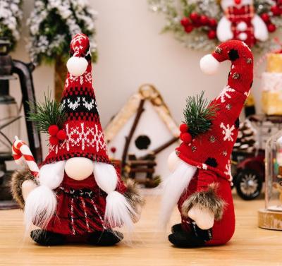 China Soft Plush Christmas Toy Doll with Santa Hat Scarf Boots - Care Instructions Included for sale