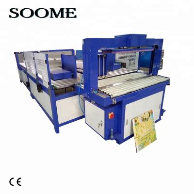 China Corrugated cartons automatic strapping machine corrugated cartons wrapping packing machine for sale