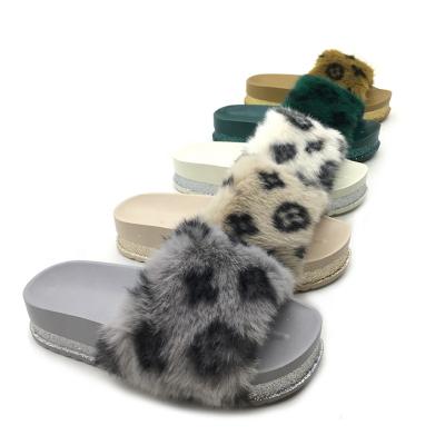 China Fashion Trend Plush Bedroom Slippers Women Faux Fur Fluffy Hairy Slippers For Women Party High Unique Slippers for sale