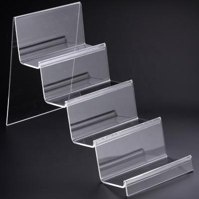 China Four Layer Camera Acrylic Digital Display Shelf Window Acrylic Props for sale