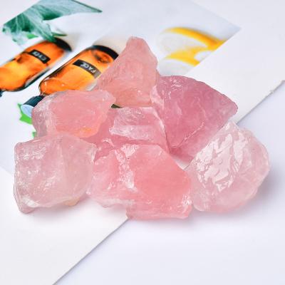 China Wholesale Raw China Natural Pink Powder Gemstone Rose Crystal Stones For Sale for sale