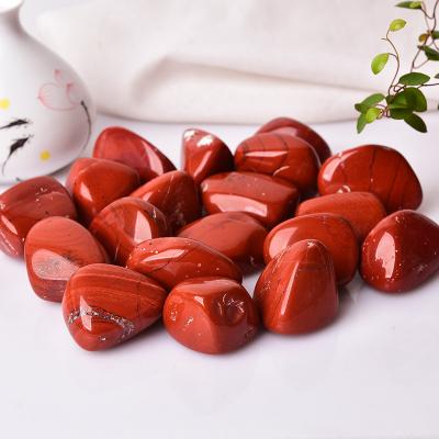 China Feng Shui Wholesale Natural Red Jasper Stone Polished Tumbled Stone Reiki Healing Stone For Fish Tank for sale