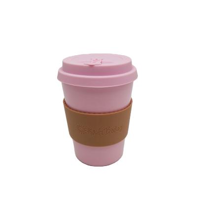 China Sustainable Cosmetics company gifts 12 OZ 350 ML pink color bamboo fiber coffee cups brown silicone band with debossed logo for sale